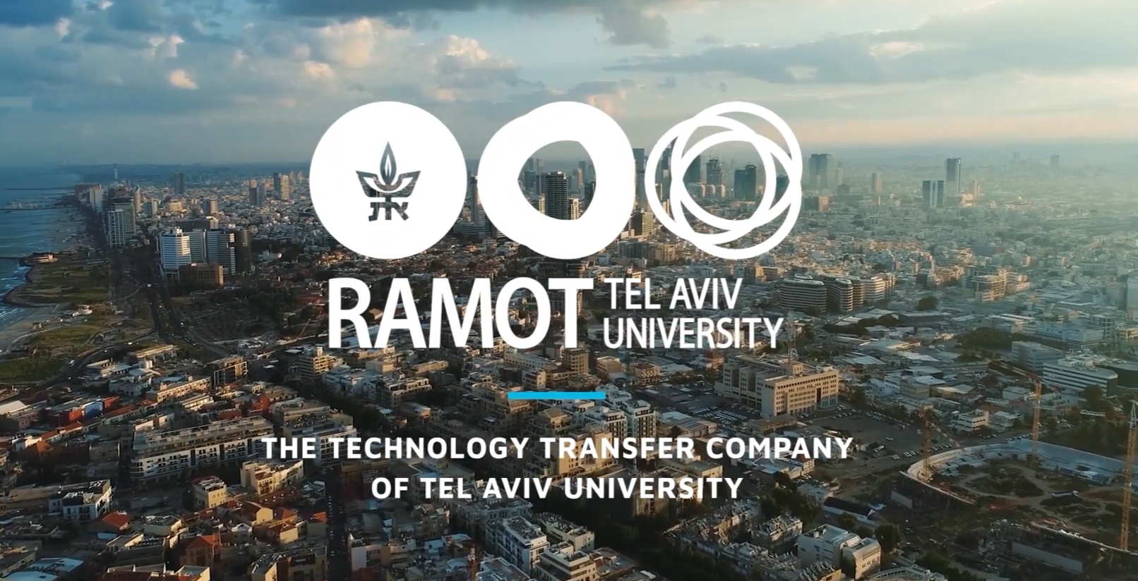 Aerial view of Tel Aviv skyline with Ramot Tel Aviv University logo and text identifying its technology transfer company.