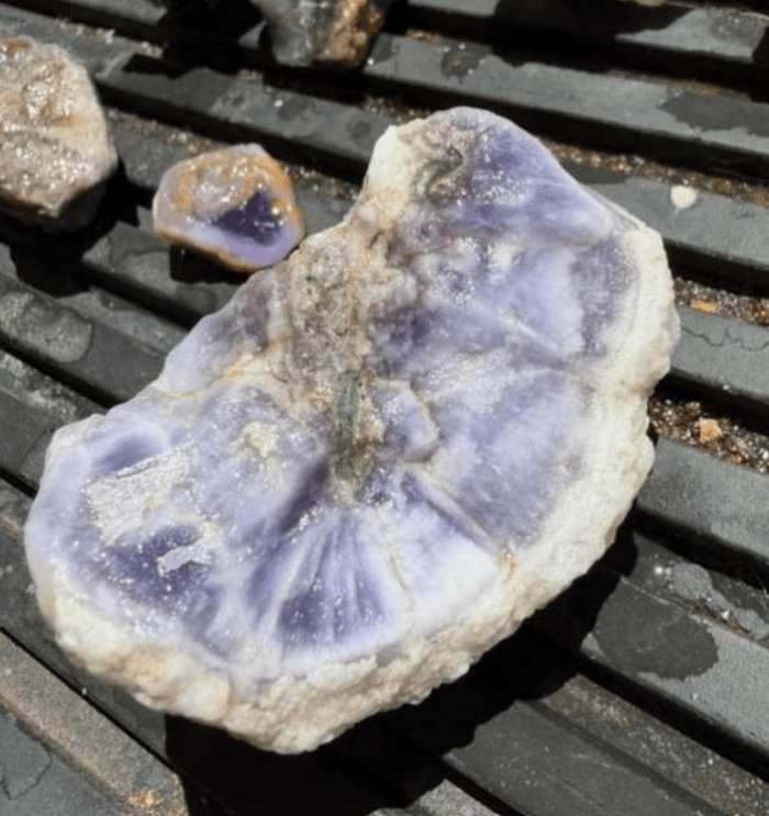 Hand specimen of pale purple fluorspar showing radial crystal growth, collected from the Carp Fluorspar Project, Nevada.