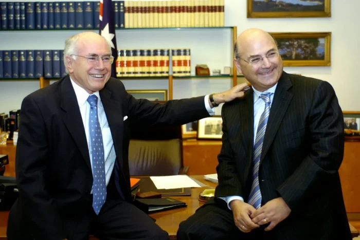 Former Australian Prime Minister John Howard and Arthur Sinodinos in a parliamentary office.