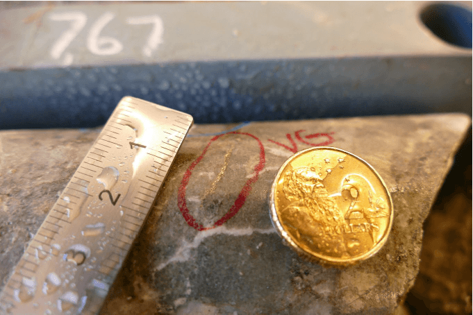 Visible gold circled in red on Elk Range Mining drill core from 234 metres down at the Friday Gold Mine in Idaho.